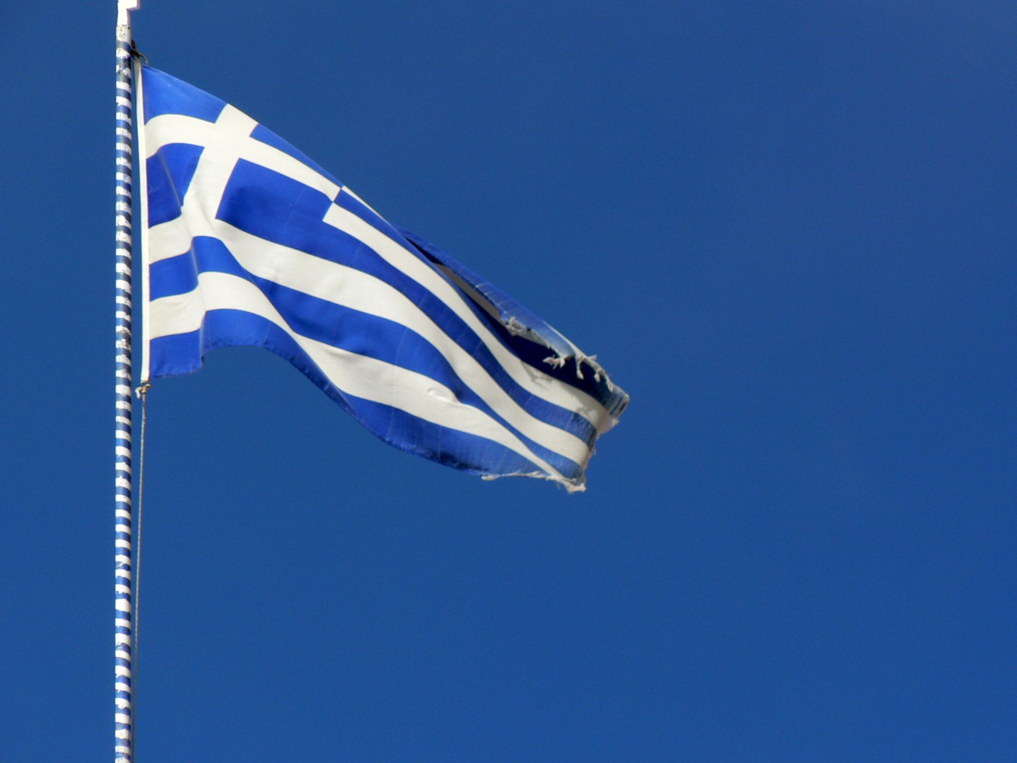 Greek flag (Photo credit: wimbledonian /Flickr) Greek flag (Photo credit: wimbledonian /Flickr)
