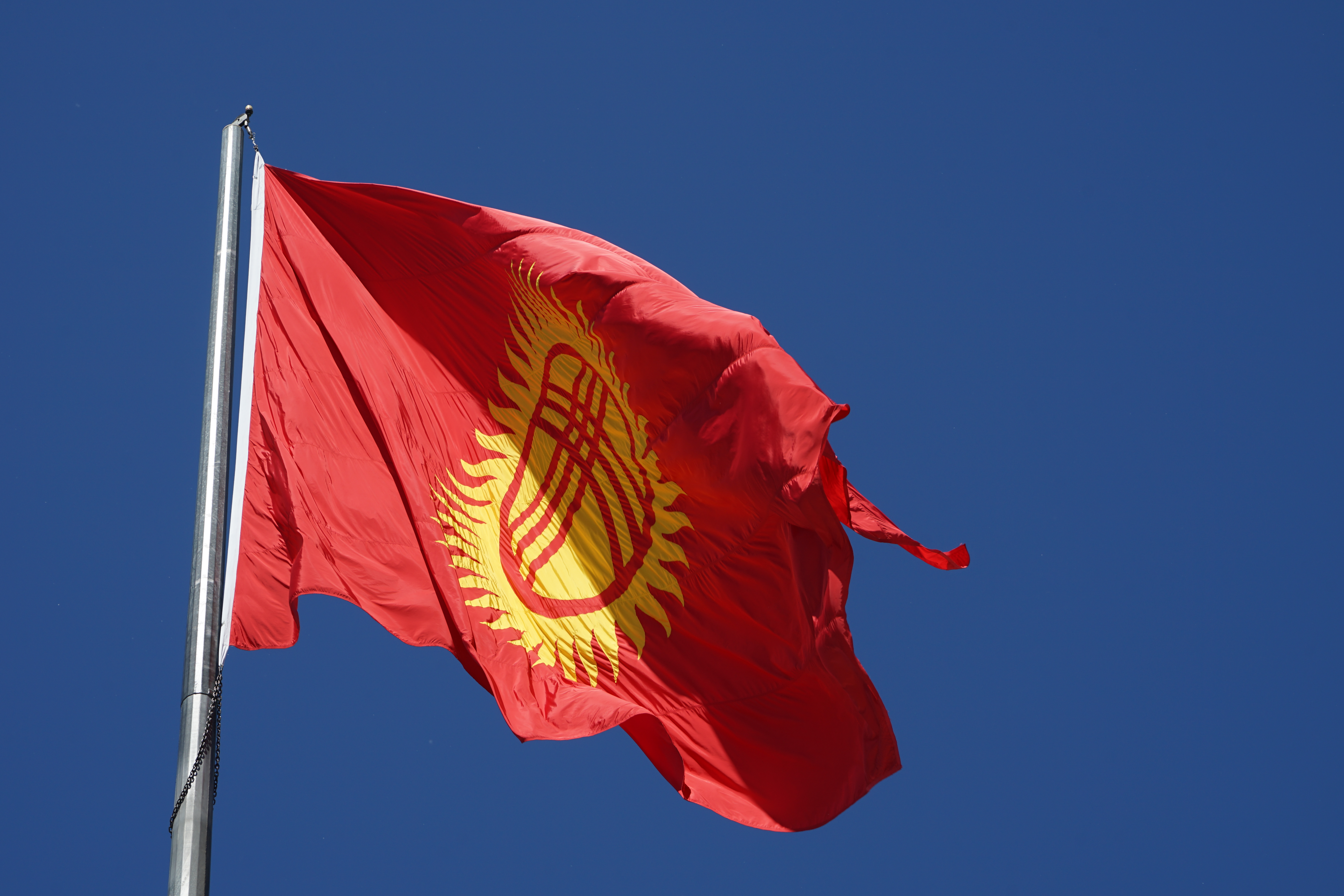 Flag of Kyrgyzstan (photo credit: Kalpak Travel/flickr) Flag of Kyrgyzstan (photo credit: Kalpak Travel/flickr)