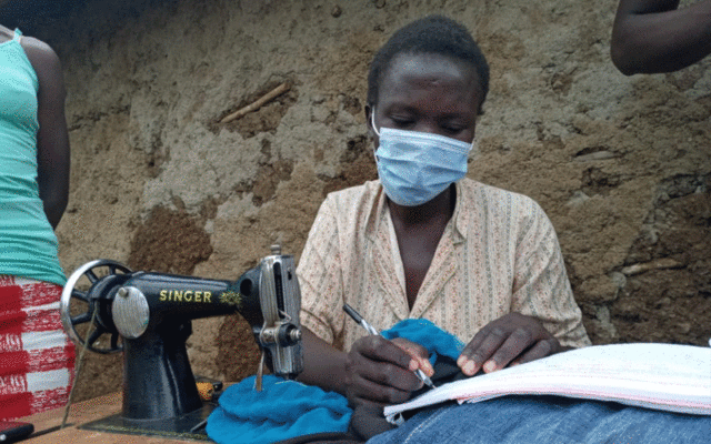 A Kenyan Citizen signs the popular initiative (Photo credit: PD/Viola Kosome)