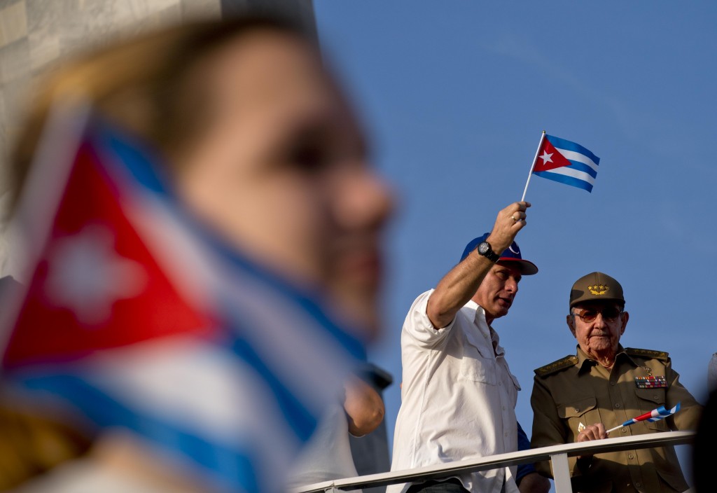 Miguel Diaz-Canel waves a flag (photo credit: Taiwan News)