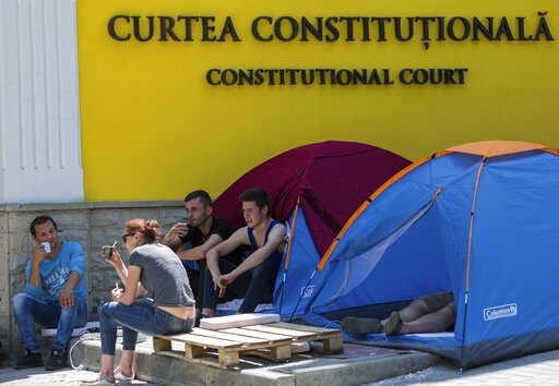 Supporters of the Former Government camp outside the Court's premises (photo credit: CBS 17)