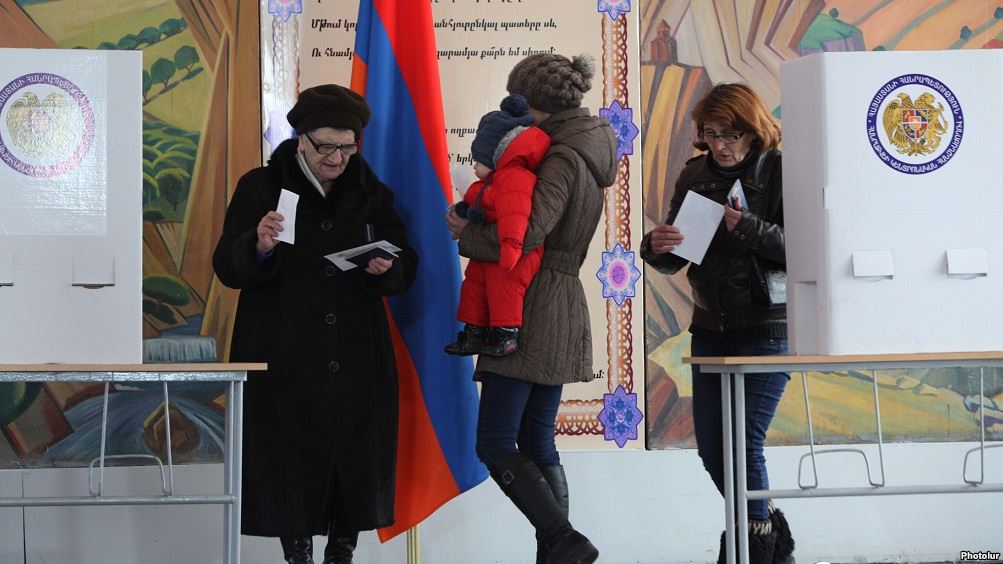 Voters participating in Armenia's December 6 referendum (photo credit: RFE/RL) Voters participating in Armenia's December 6 referendum (photo credit: RFE/RL)