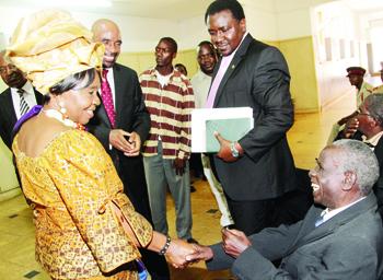 Chieftainess Nkomeshya Mukamambo ll (l) with chief Nabwalya (seated)