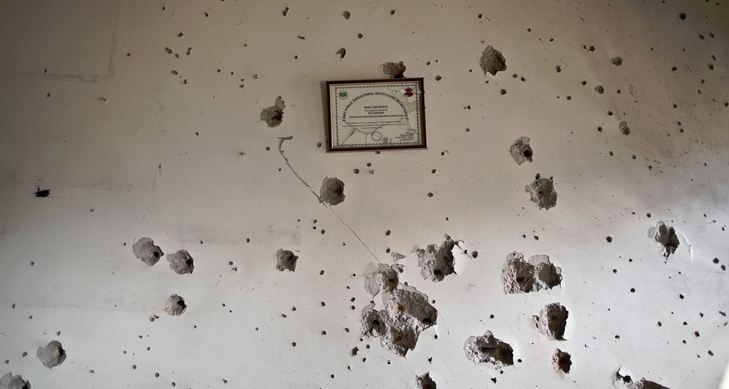 A wall shows bullet marks inside the Army Public School, attacked Tuesday by Taliban gunmen in Peshawar, Pakistan, Thursday, Dec. 18, 2014. The Taliban massacre that killed more than 140 people, mostly children, at the military-run school in northwestern Pakistan left a scene of heart-wrenching devastation, pools of blood and young lives snuffed out as the nation mourned and mass funerals for the victims got underway. (AP Photo/Muhammed Muheisen) (AP Photo/Muhammed Muheisen)
