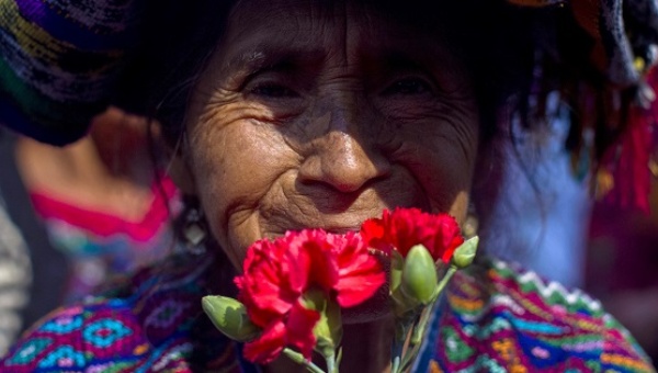 An Indigenous woman demonstrates during the genocide trial against former Guatemalan dictator Erfain Rios Montt (photo credit: EFE)