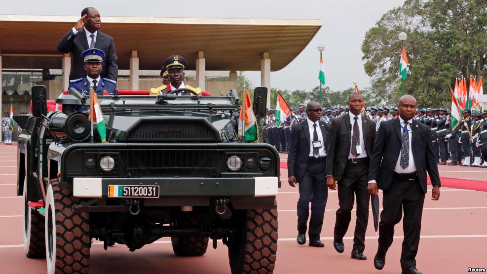 Ivory Coast's President Alassane Ouattara in a parade to commemorate the country's 56th Independence Day (Photo credit: Reuters)