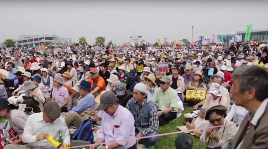 Protesters against planned changes (photo credit: Ruptly) 