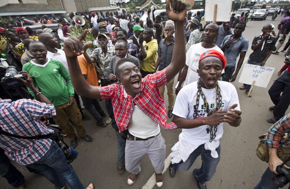 Protesters calling for disbandment of electoral commission (photo credit: Ben Curtis/AP)