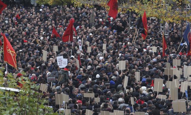 People gather in a peaceful protest called by Kosovo's opposition against the EU-brokered accord between Kosovo and Serbia in the capital Pristina, November 28, 2015. (photo credit: Reuters) People gather in a peaceful protest called by Kosovo's opposition against the EU-brokered accord between Kosovo and Serbia in the capital Pristina, November 28, 2015. (photo credit: Reuters)