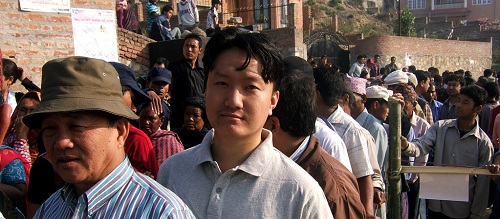 Voters lining up at polling station to vote: C/Flickr/Ashish Lohorung