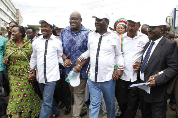 Okoa Kenya leaders Martha Karua, Kalonzo Musyoka, John Githongo, Raila Odinga and Moses Wetang?ula and Okoa Kenya Committee of Experts chairman Paul Mwangi walk to the IEBC offices 9 Nov 2015 (photo credit: The Star)