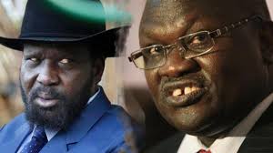 L2R:President Kiir and Former Vice President Machar, the man at the centre of th
