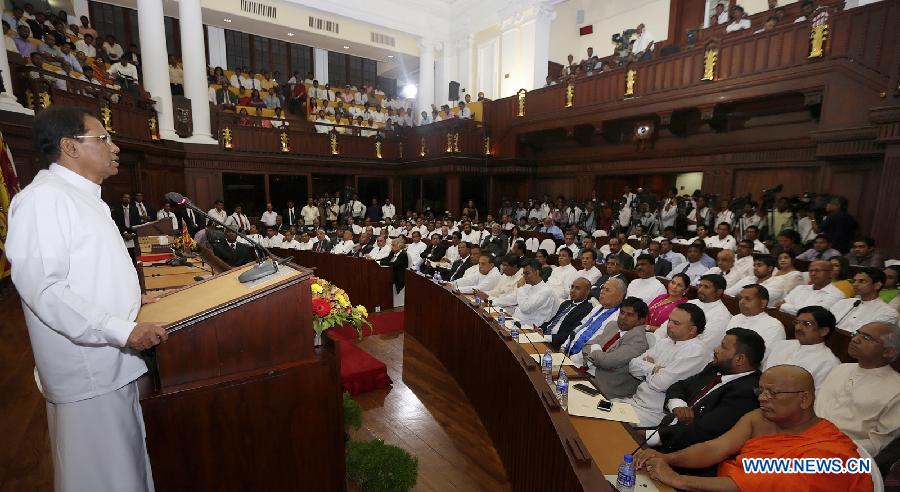 Sri Lankan President Maithripala Sirisena (L) addresses members of parliament at Parliament House in Colombo. (Photo: AFP/President's Office) Sri Lankan President Maithripala Sirisena (L) addresses members of parliament at Parliament House in Colombo. (Photo: AFP/President's Office)