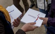 Constitutional drafts handed out in anticipation of referendum vote (photo credit: Sebastián Vivallo Oñate / Agencia Makro / Getty Images)