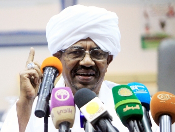 President Omer Hassan al-Bashir addresses the general convention of the ruling National Congress Party (photo credit: Sudan News Agency)