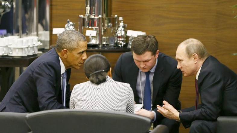 U.S. President Barack Obama (L) talks with Russian President Vladimir Putin (R) and U.S. security advisor Susan Rice (2nd L) prior to the opening session of the Group of 20 (G20) Leaders’ summit in Antalya, Turkey Nov. 15, 2015. (photo credit: Reuters)