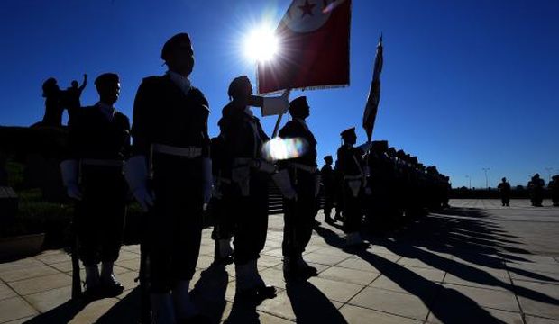 Tunisian military band members perform during a symbolic funeral for soldiers killed by terrorists. Photo//Fethi Belaid Tunisian military band members perform during a symbolic funeral for soldiers killed by terrorists. Photo//Fethi Belaid