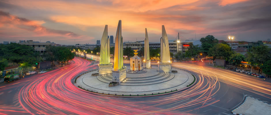 Democracy of Monument and four wing-like structures which guard the Constitution, Situated on a traffic circle on Ratchadamnoen Klang at Bangkok Thailand [photo credit: Office Holidays]