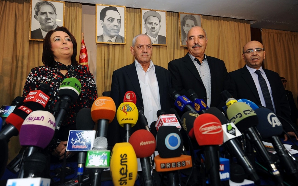 A photo taken on September 21, 2013 shows Tunisian mediators (LtoR) the President of the Tunisian employers union (UTICA), Wided Bouchamaoui, Secretary General of the Tunisian General Labour Union (UGTT) Houcine Abbassi (L) , President of the Tunisian Human Rights League (LTDH), Abdessattar ben Moussa and the president of the National Bar Association, Mohamed Fadhel Mahmoud at a press conference in Tunis. (photo credit: Fethi Belaid / AFP / Getty Images)