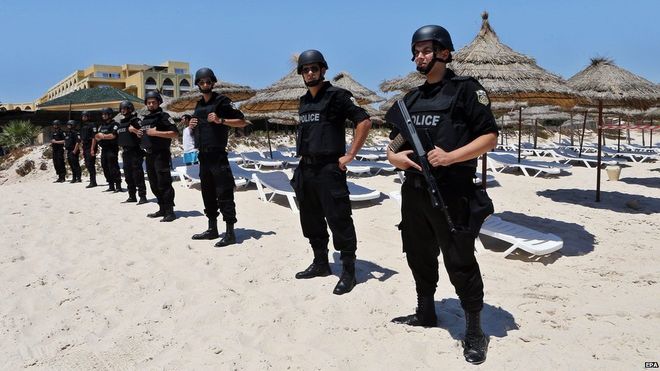 Armed members of Tunisia's security forces were deployed to the beach at Sousse for a ceremony of remembrance one week after the attack (photo credit: BBC) Armed members of Tunisia's security forces were deployed to the beach at Sousse for a ceremony of remembrance one week after the attack (photo credit: BBC)