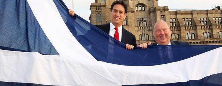 Labour leader Ed Miliband with Liverpool City Council leader Joe Anderson, raising a Saltire on Liverpool waterfront on Tuesday. PA Labour leader Ed Miliband with Liverpool City Council leader Joe Anderson