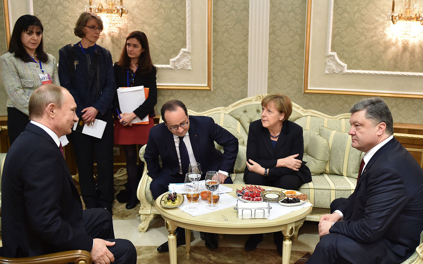 Talks between Vladimir Putin, Francois Hollande, Angela Merkel and Petro Poroshenko have last through the night [photo credit: AFP/ Getty Images]