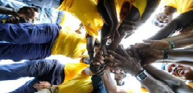 South Sudanese police hold hands in camaraderie during celebrations to mark the International Day of Peace, 21 September, 2011. Photograph by UN Photo/Isaac Billy. Photograph by UN Photo/Isaac Billy.